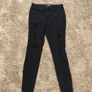 Black distressed skinny jeggings